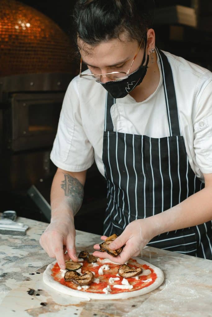 a chef cooking a pizza in casablanca